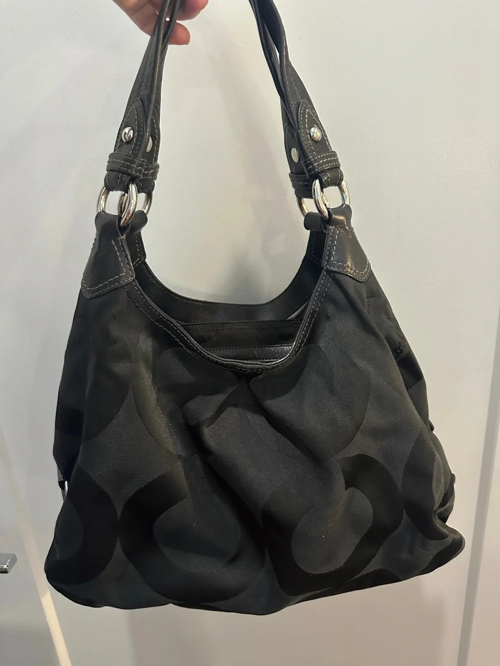 Coach features pockets